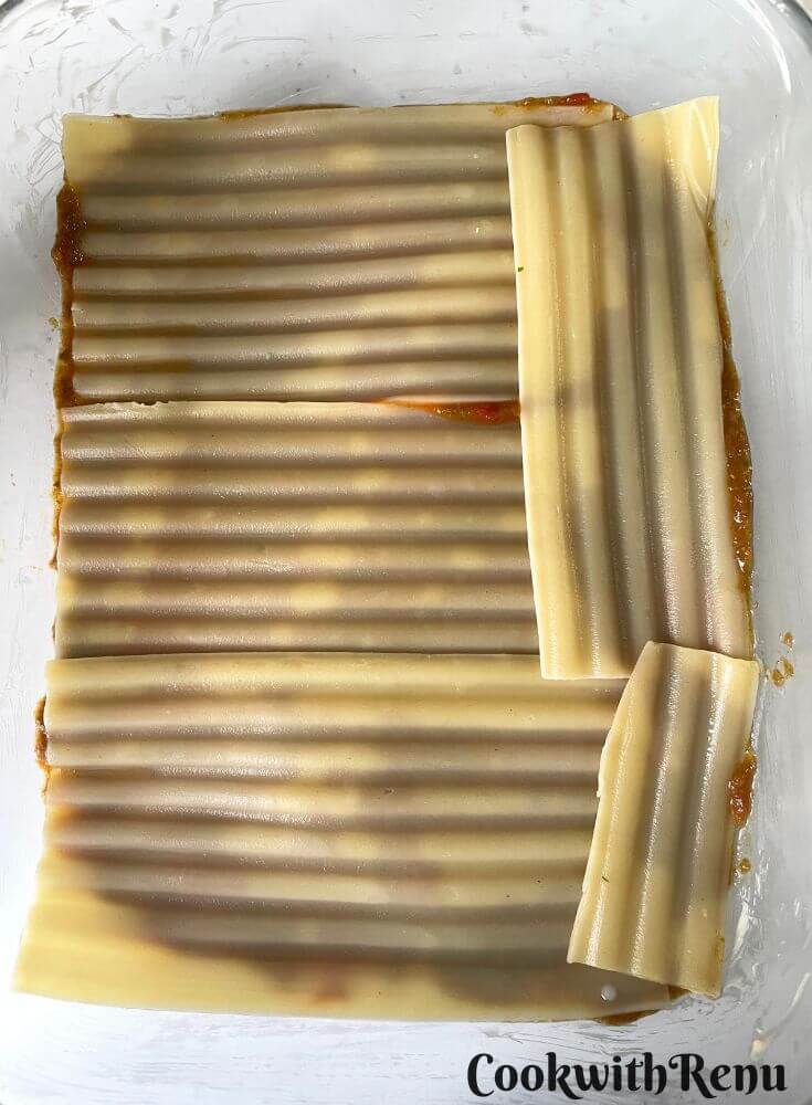 Lasagne Sheets added on top of Tomato Sauce.