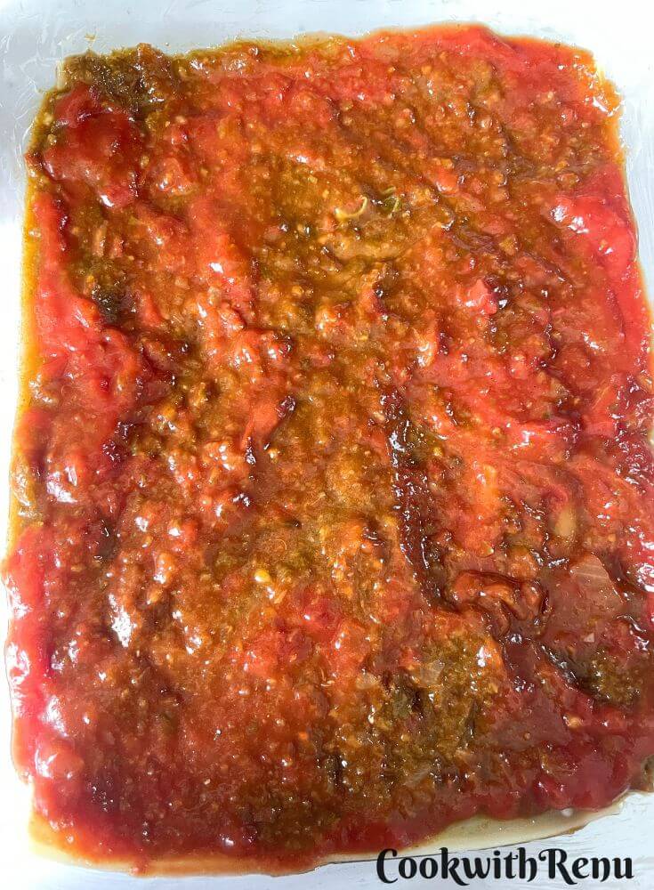 First layer of Tomato Sauce on a baking tray.
