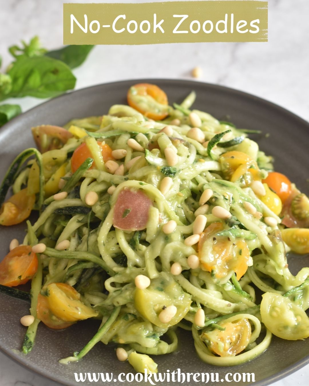 Zoodles salad served in grey plate.