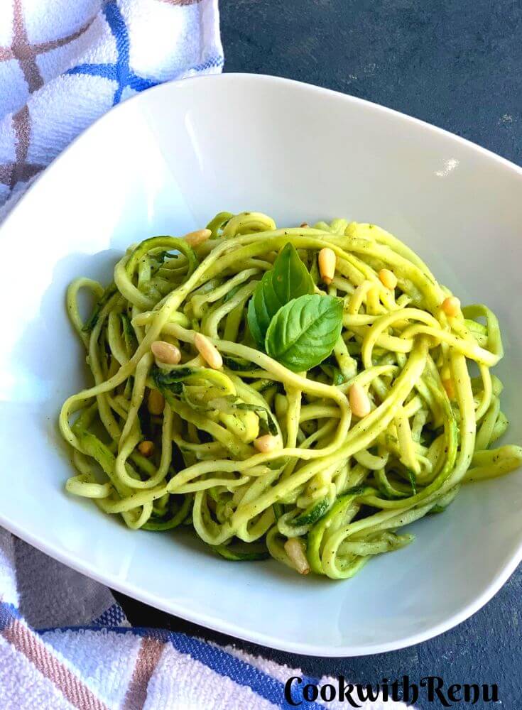 Zoodles salad served in white plate.