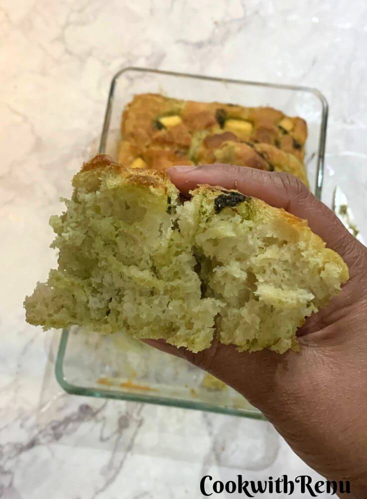 Texture of a slice of No-Knead Green Chutney Focaccia With Tofu