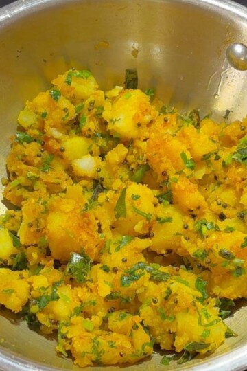 Aloo Bhaji in a wok.