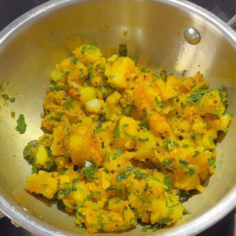 Aloo Bhaji in a wok.