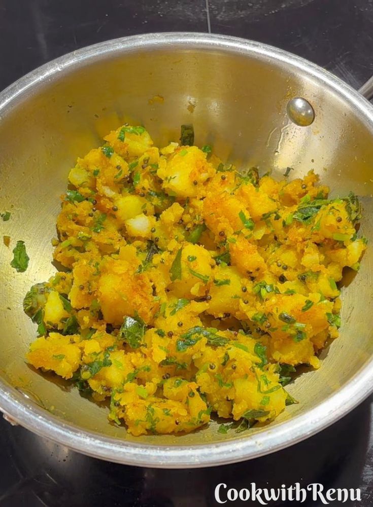 Aloo Bhaji in a wok.