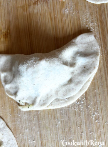 Momos getting shapped on a board.