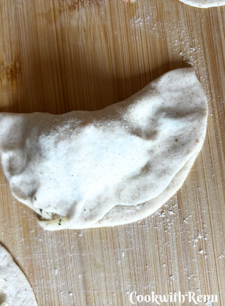 Momos getting shapped on a board.