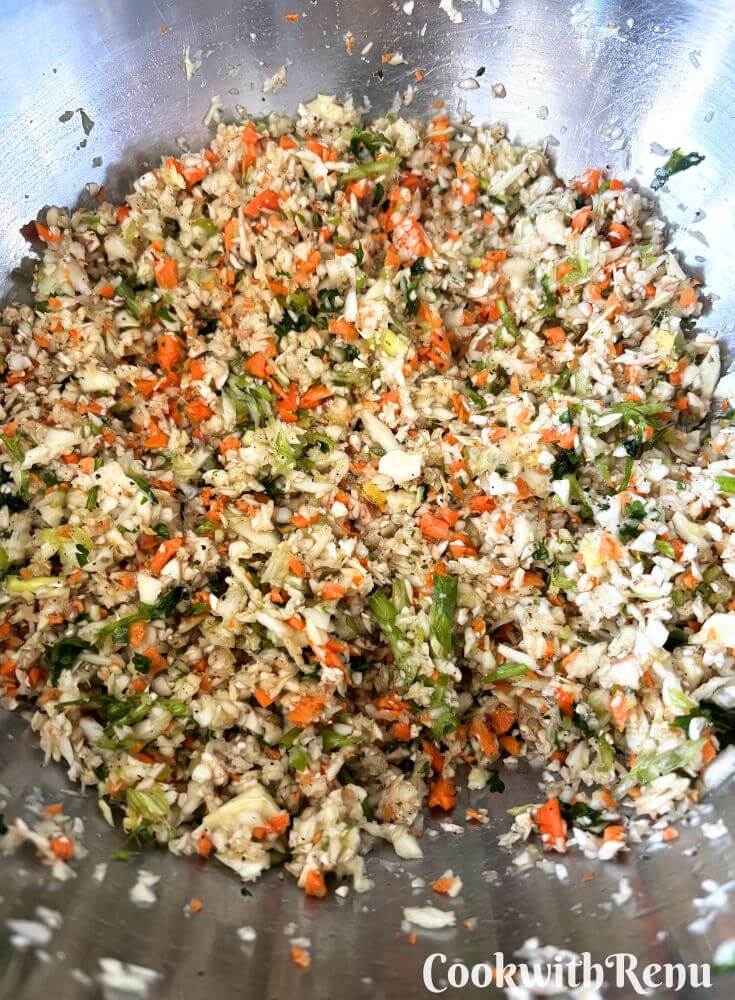 Squeezed Veggie Mixture in a bowl.
